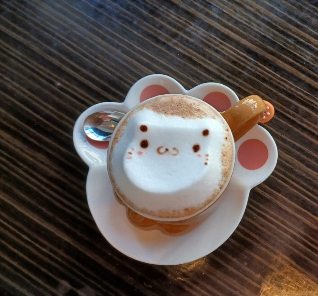 The Who Cafe hot latte with 3D latte art