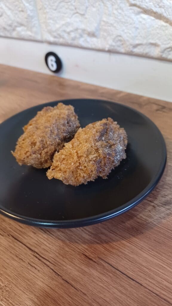 The two free fried clams at Shokunin Don Late-Night Diner