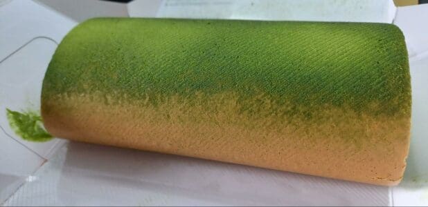 Yannick Uji Matcha Fresh Cream Roll, side view of the actual cake