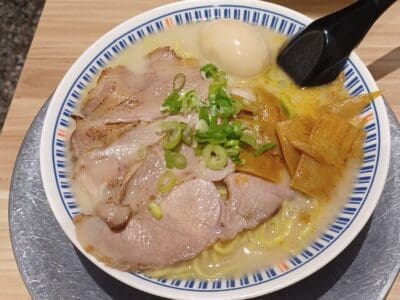 Shoyu tonkotsu ramen with extra chashu and a soft-boiled egg, NT$185.