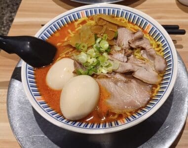 Spicy mala tonkotsu ramen with a soft-boiled egg, NT$170.